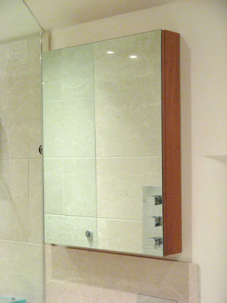 Mirrored mahogany bathroom cabinet