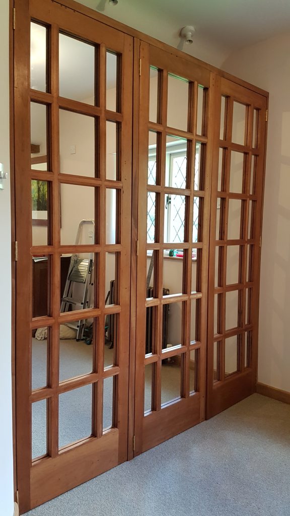 Mirrored internal mahogany wardrobe doors